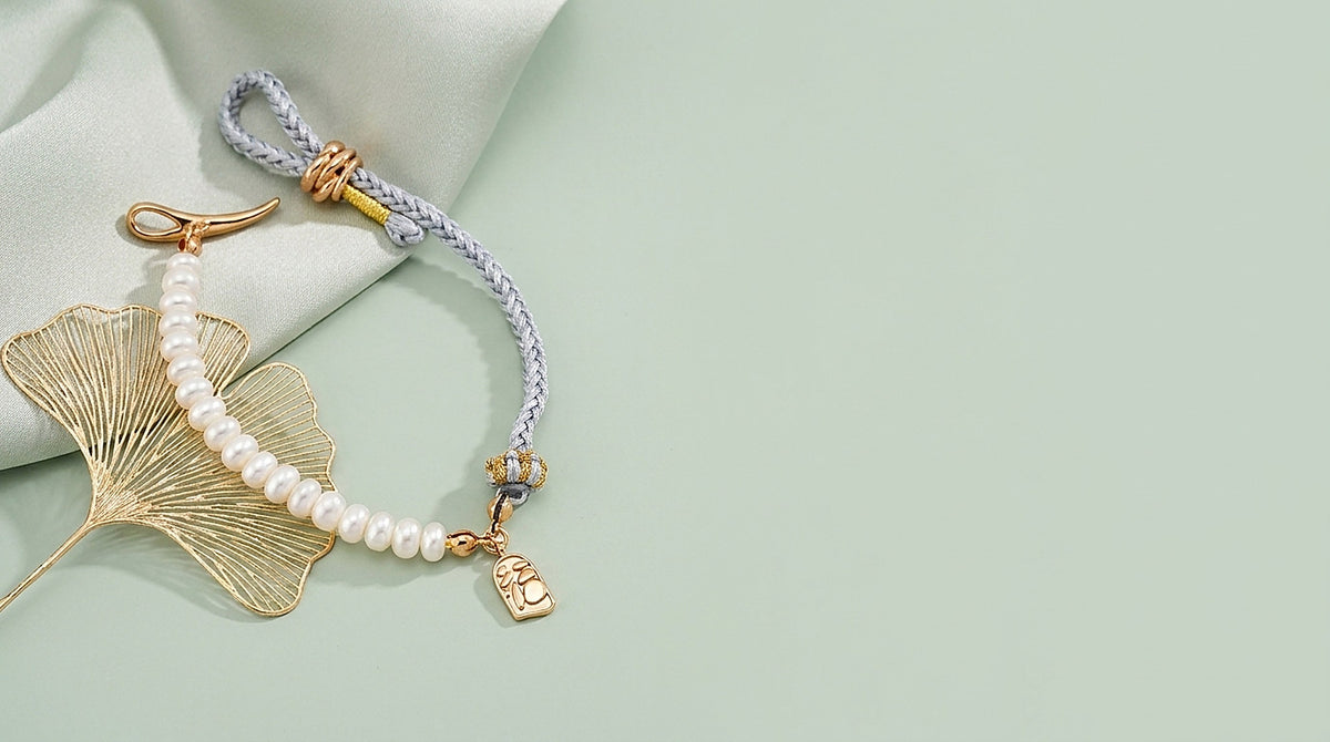 Sterling silver freshwater pearl bracelet on a celadon background