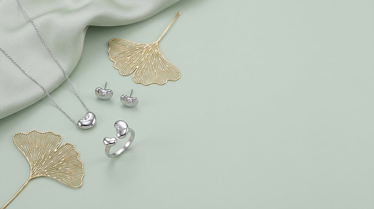 Sterling silver and zircon jewelry set on a celadon background