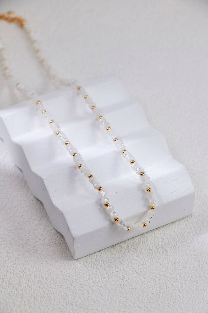White shell and gold bead necklace