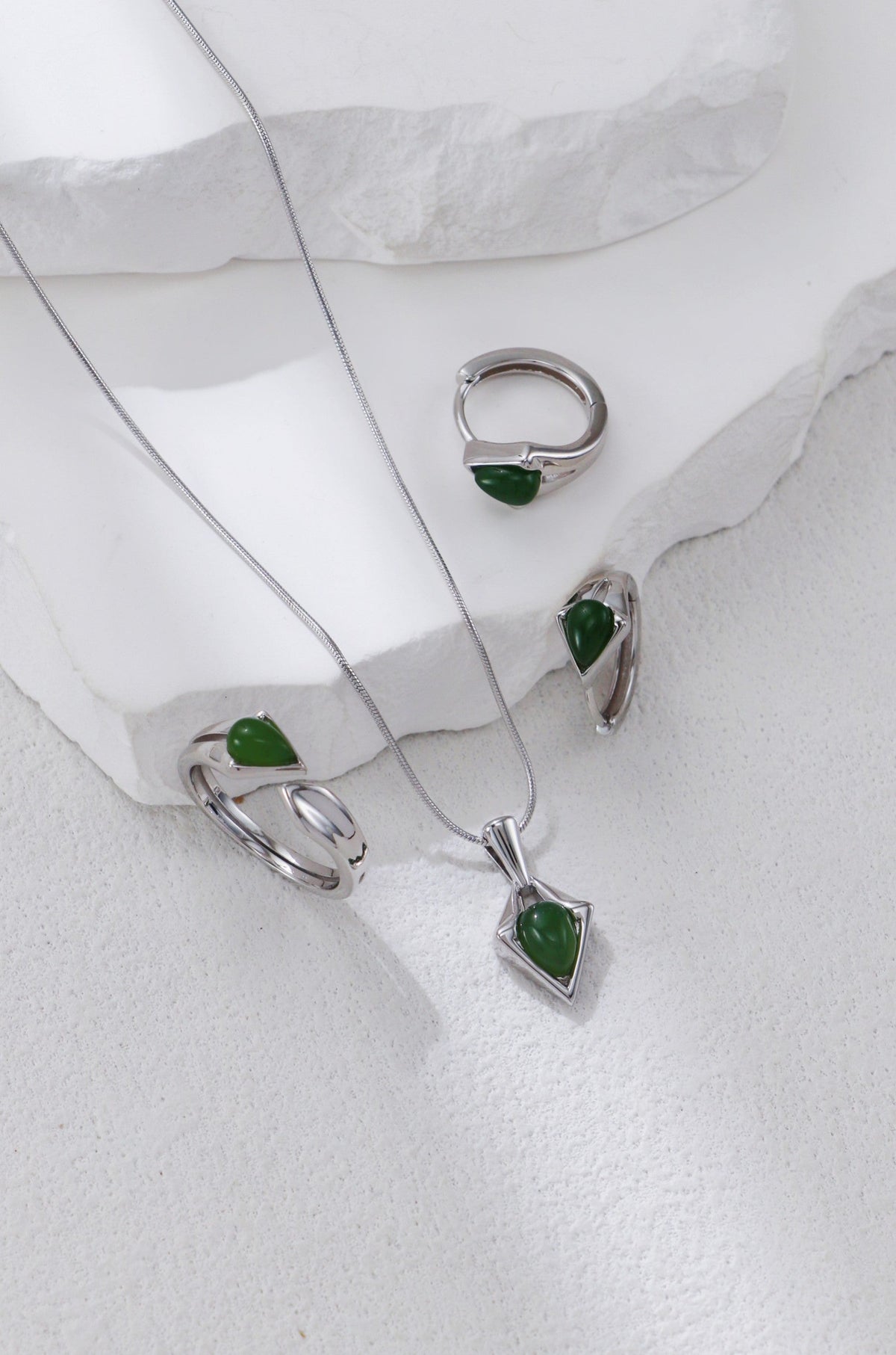 Hotan jade necklace, earrings and ring in sterling silver