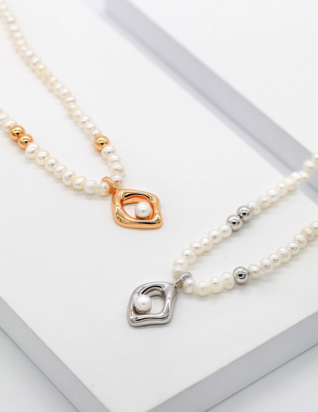 Avant-Garde Sterling Silver Pearl Necklace and Earring Set