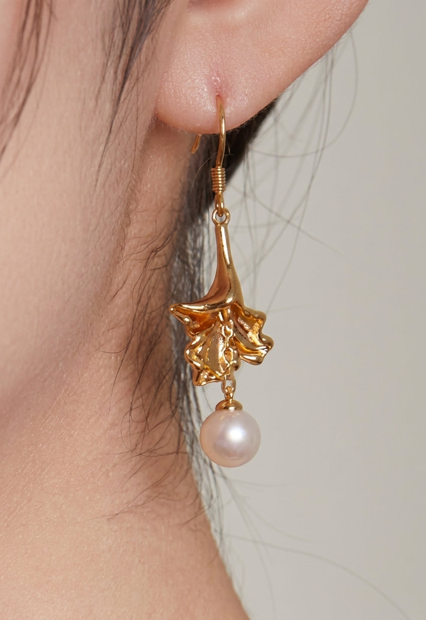 Sterling Silver Retro Gold Pearl Earrings - close up on ear